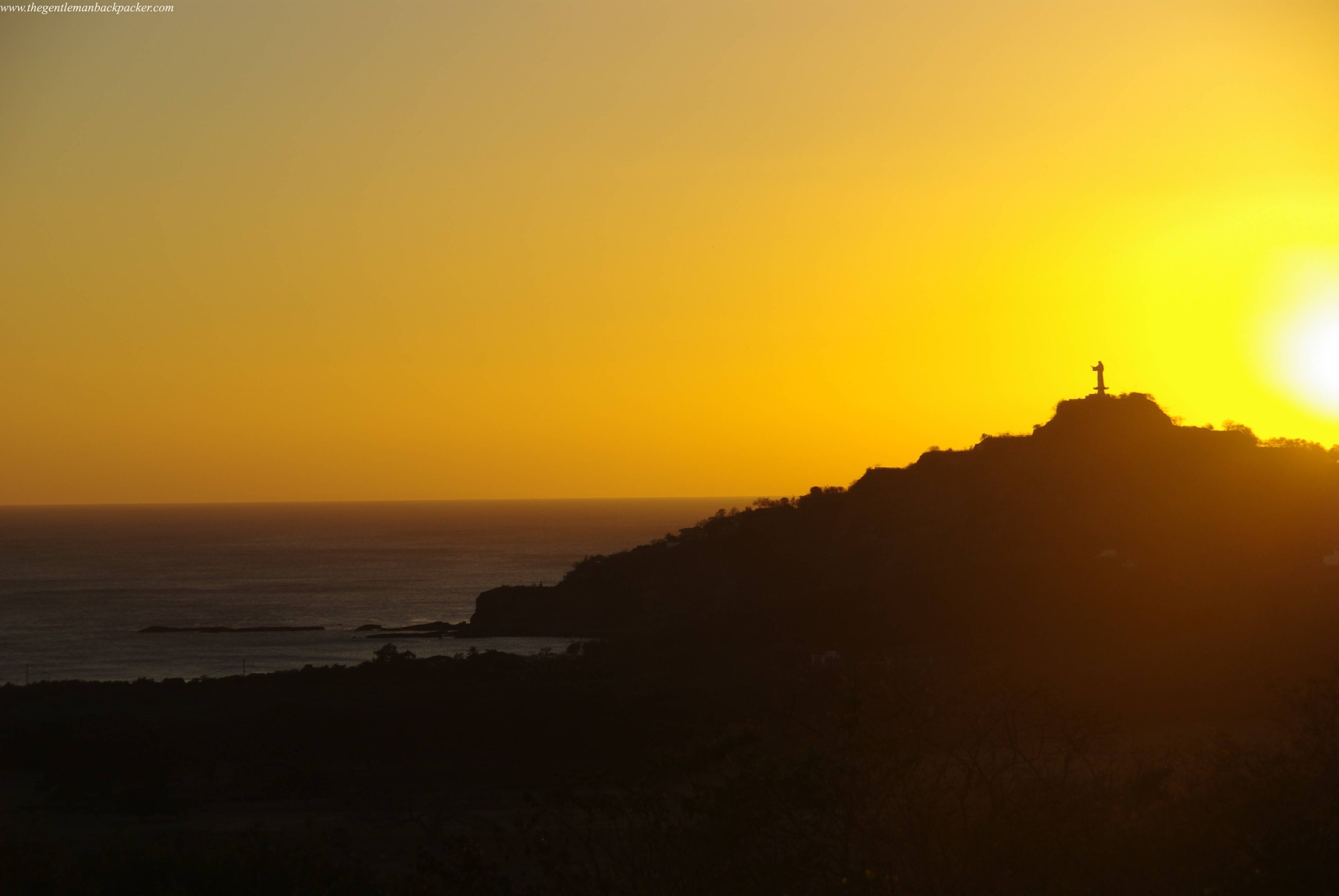 Sunset and Statue of Christ, from Casa de Olas
